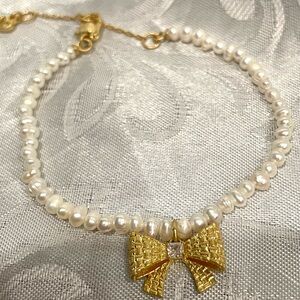 kate spade White Pearl Bracelet with Gold Bow Charm